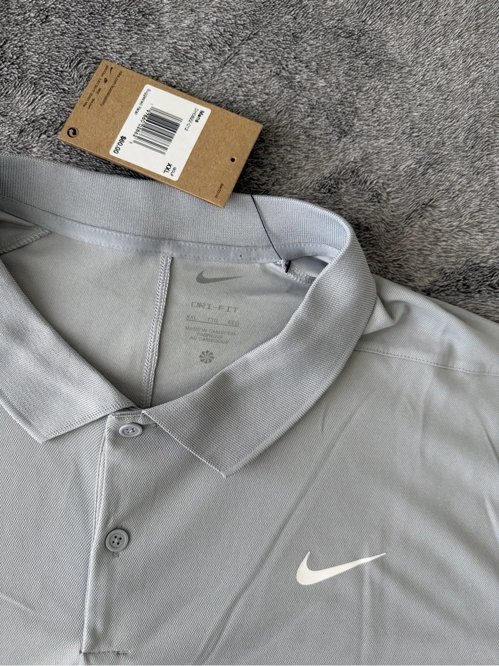 Nike Men’s Light Silver Gray Polo with White Swoosh